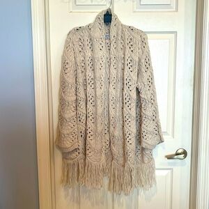 Beautiful open weave long cardigan with fringe bottom